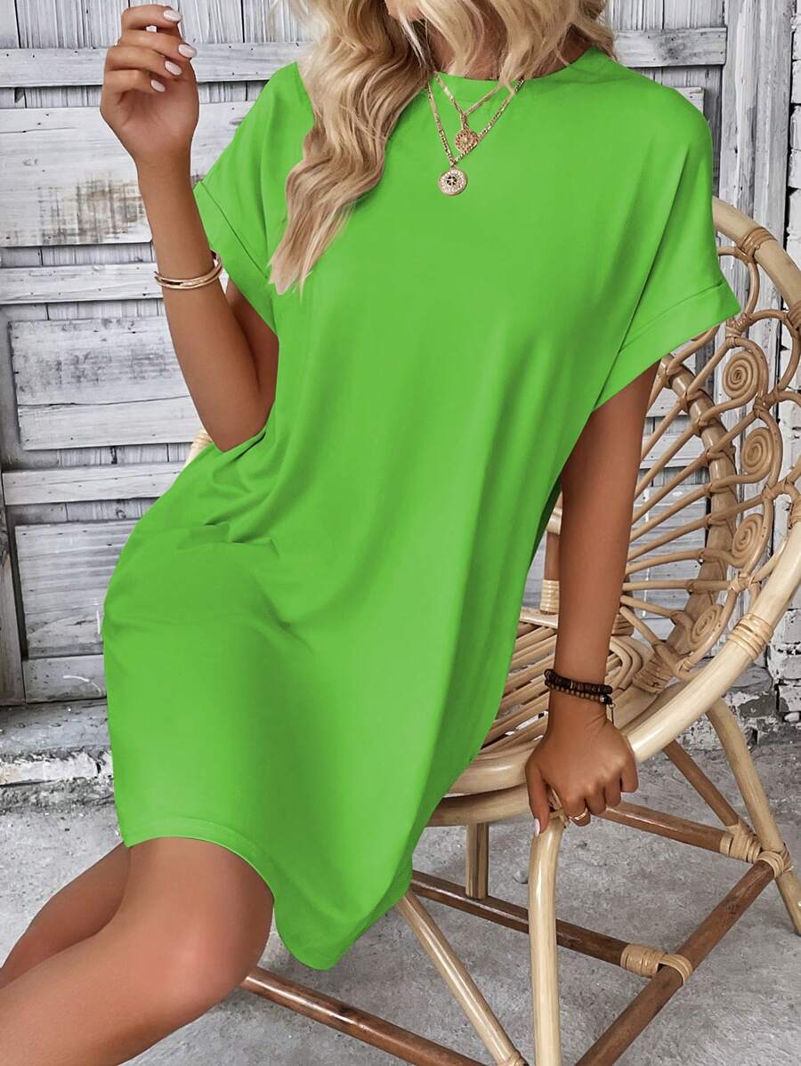 Vestido Curto Camiseta com Bolsos e Manga Morcego - La Lecce