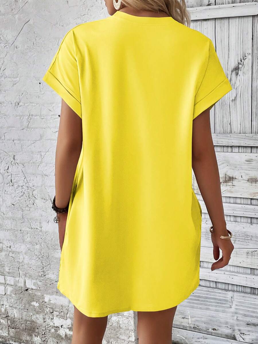 Vestido Curto Camiseta com Bolsos e Manga Morcego - La Lecce