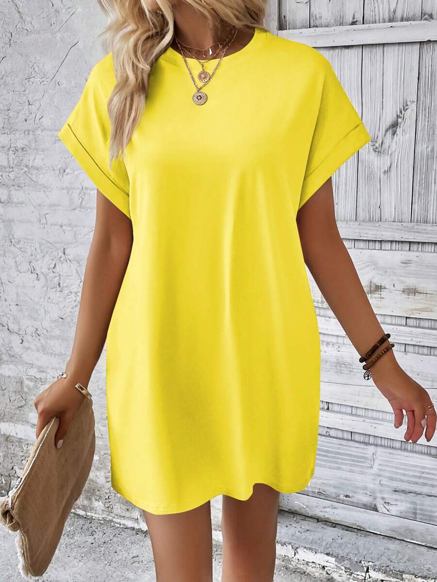 Vestido Curto Camiseta com Bolsos e Manga Morcego - La Lecce