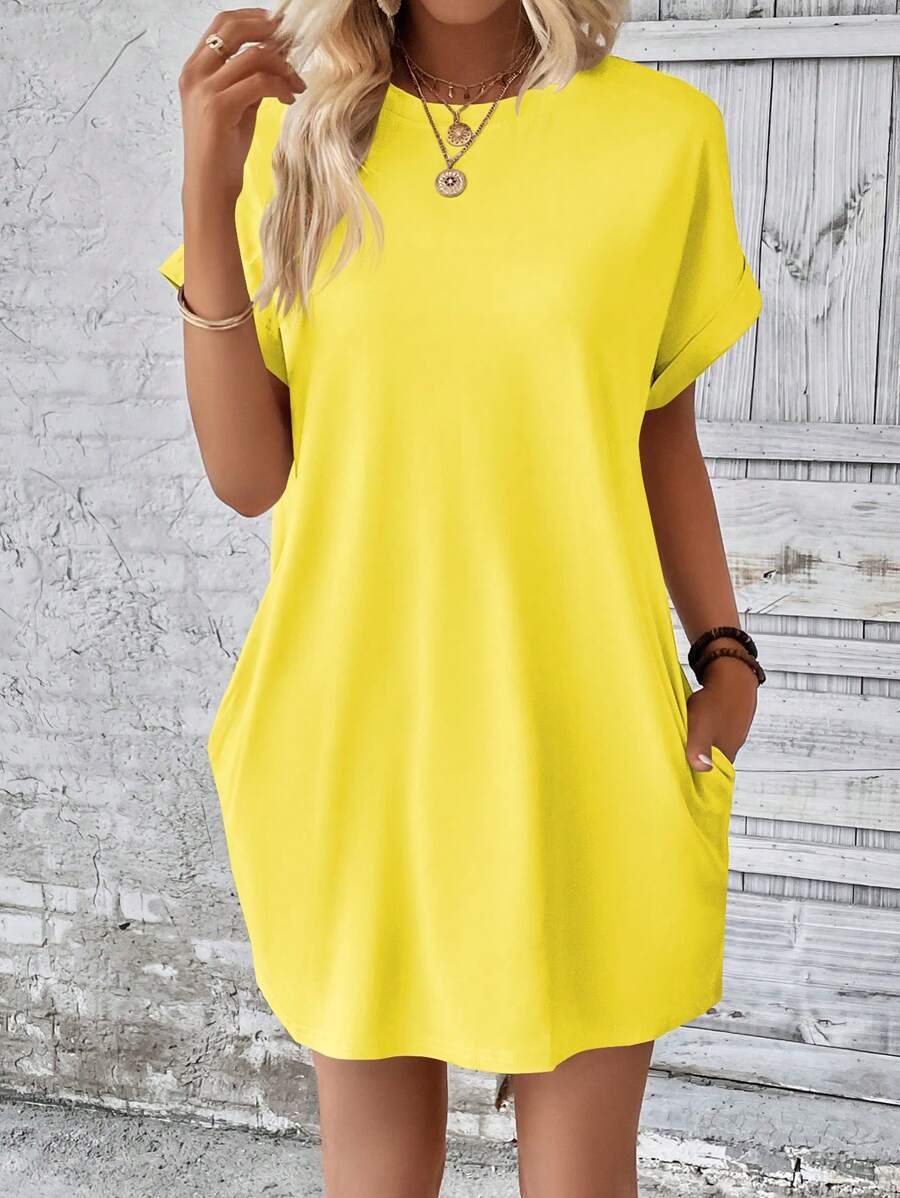 Vestido Curto Camiseta com Bolsos e Manga Morcego - La Lecce