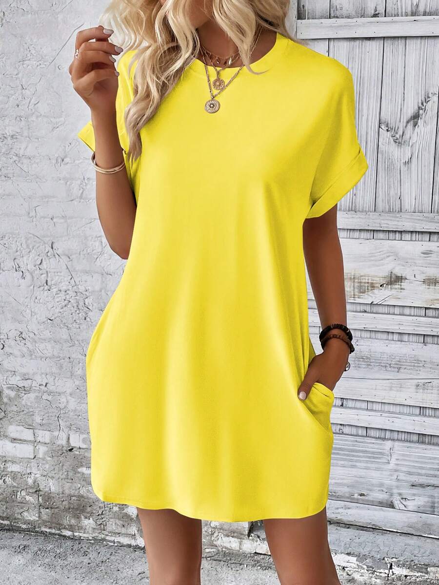 Vestido Curto Camiseta com Bolsos e Manga Morcego - La Lecce