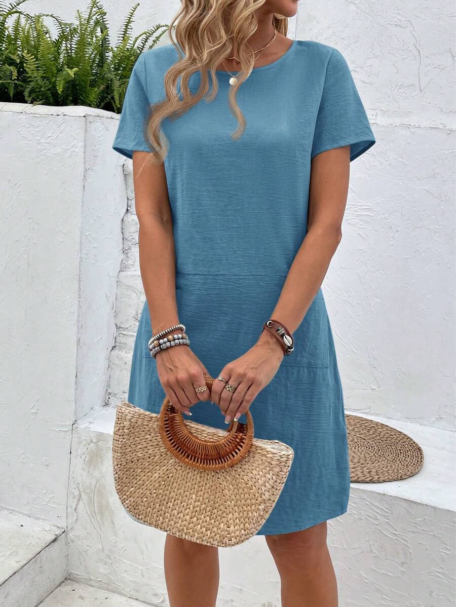 Vestido Midi Camiseta de Manga Curta com Bolsos - La Lecce