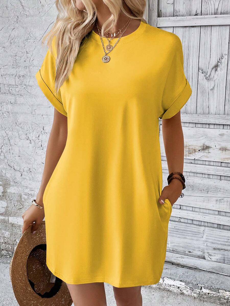 Vestido Curto Camiseta com Bolsos e Manga Morcego - La Lecce
