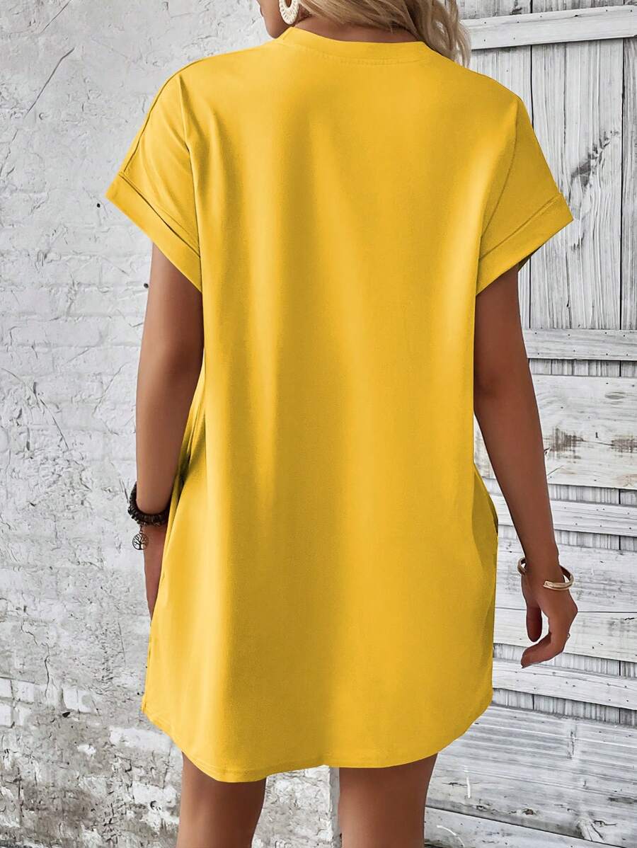 Vestido Curto Camiseta com Bolsos e Manga Morcego - La Lecce