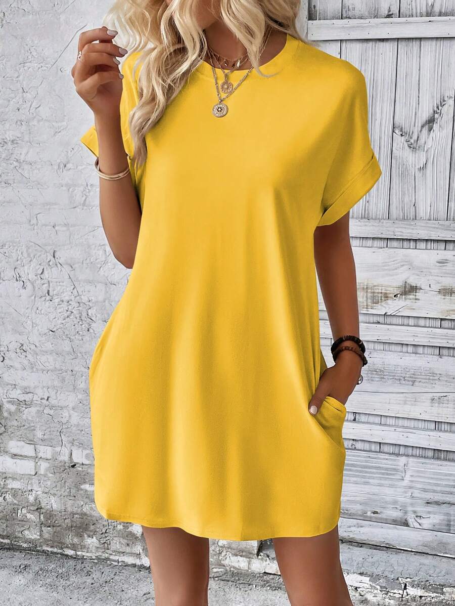Vestido Curto Camiseta com Bolsos e Manga Morcego - La Lecce