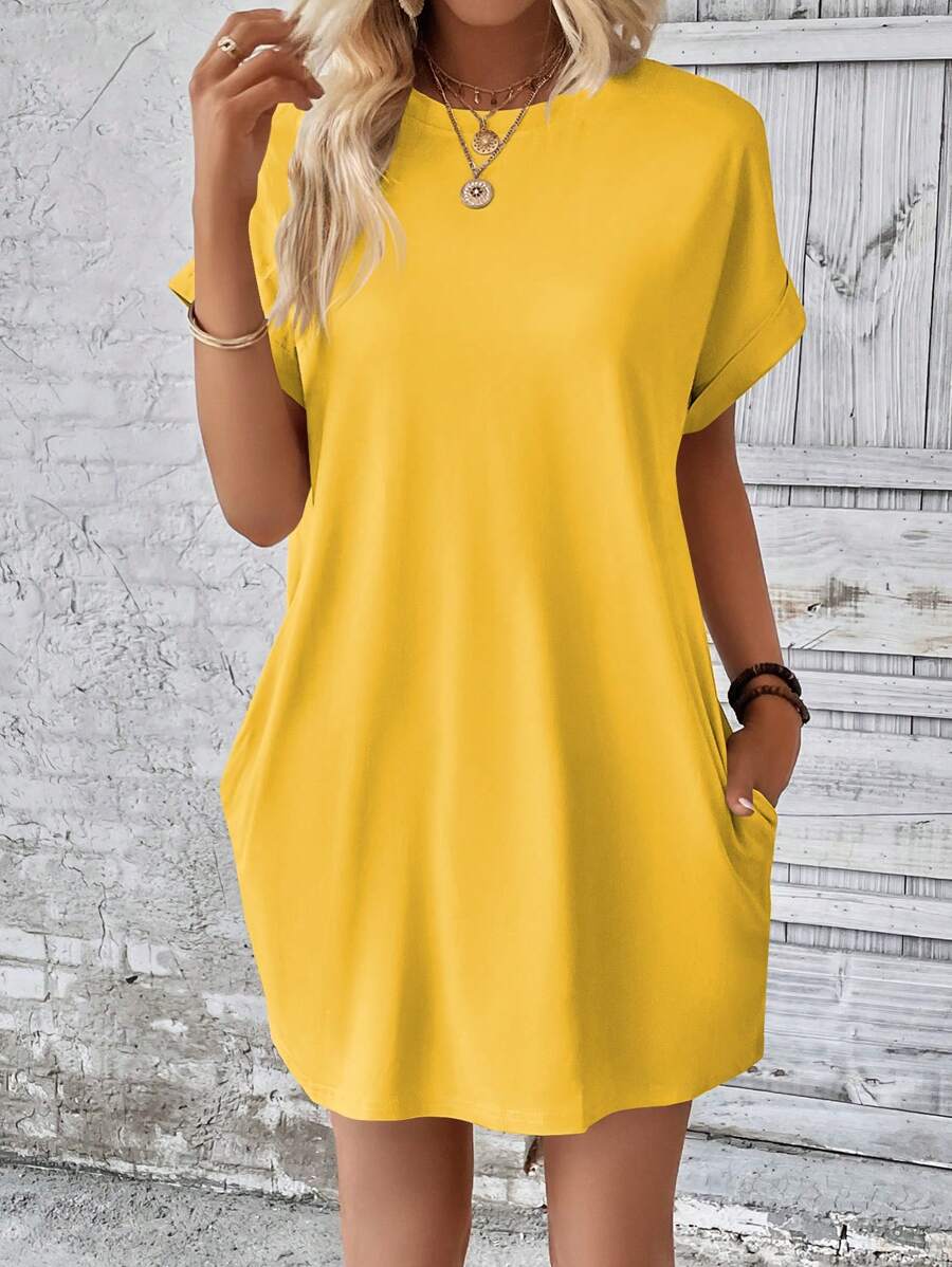 Vestido Curto Camiseta com Bolsos e Manga Morcego - La Lecce