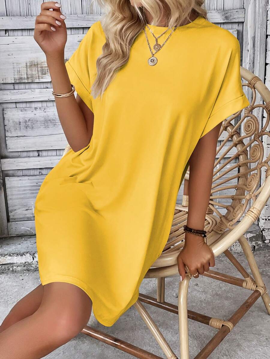 Vestido Curto Camiseta com Bolsos e Manga Morcego - La Lecce