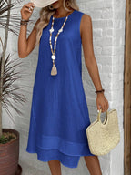 Vestido Midi Minimalista com Gola Redonda e Bainha Assimétrica - La Lecce
