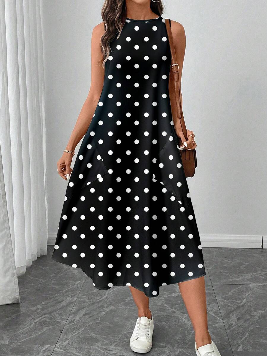 Vestido Midi Poá com Gola Redonda e Bolsos - La Lecce