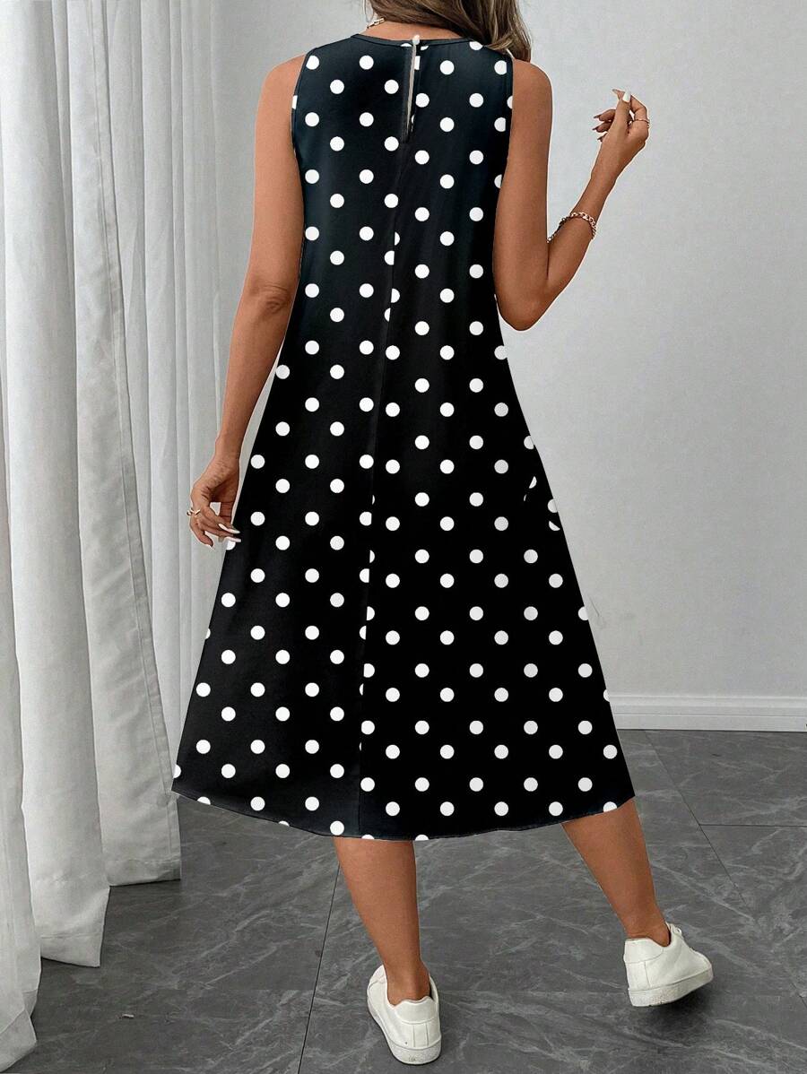 Vestido Midi Poá com Gola Redonda e Bolsos - La Lecce