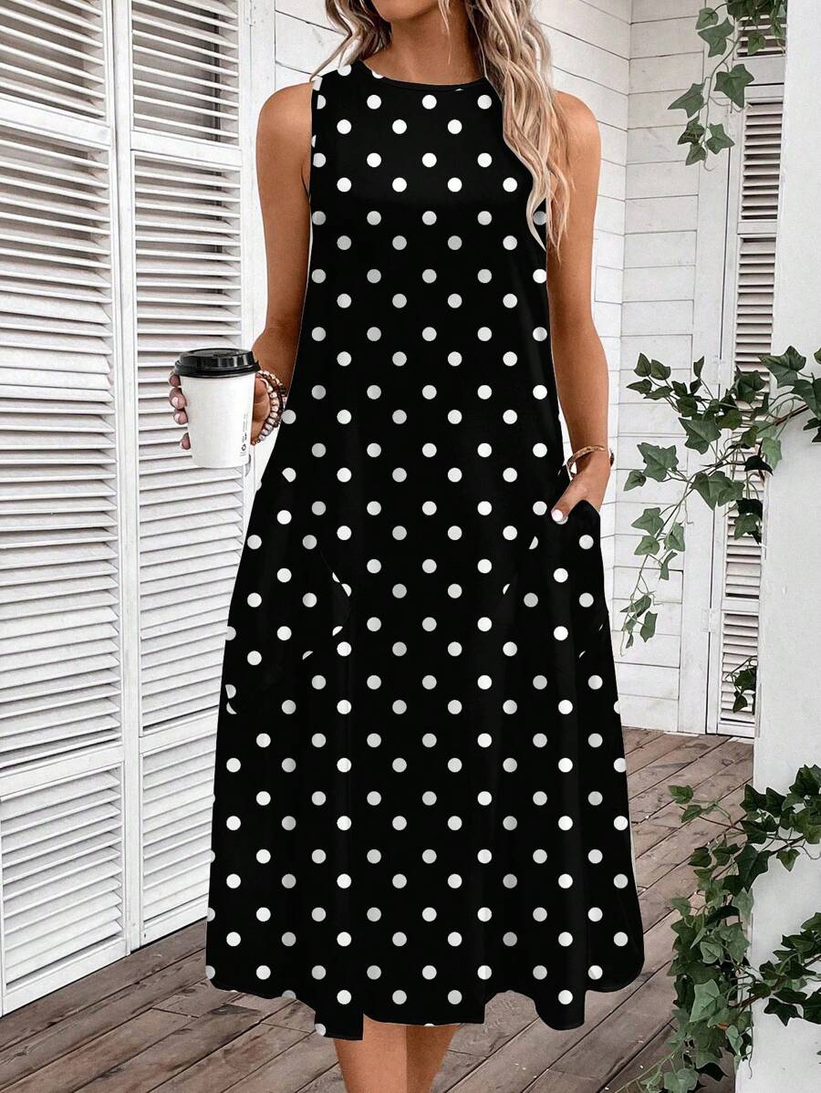 Vestido Midi Poá com Gola Redonda e Bolsos - La Lecce