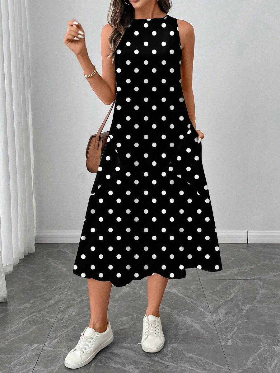 Vestido Midi Poá com Gola Redonda e Bolsos - La Lecce