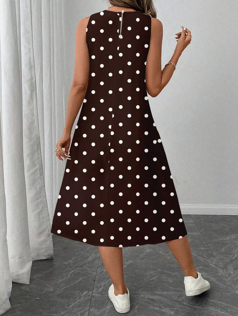 Vestido Midi Poá com Gola Redonda e Bolsos - La Lecce