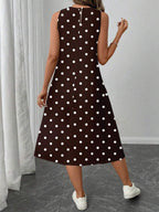 Vestido Midi Poá com Gola Redonda e Bolsos - La Lecce