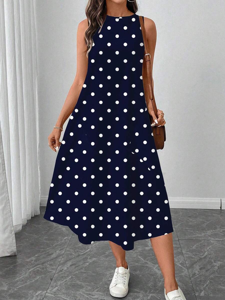 Vestido Midi Poá com Gola Redonda e Bolsos - La Lecce