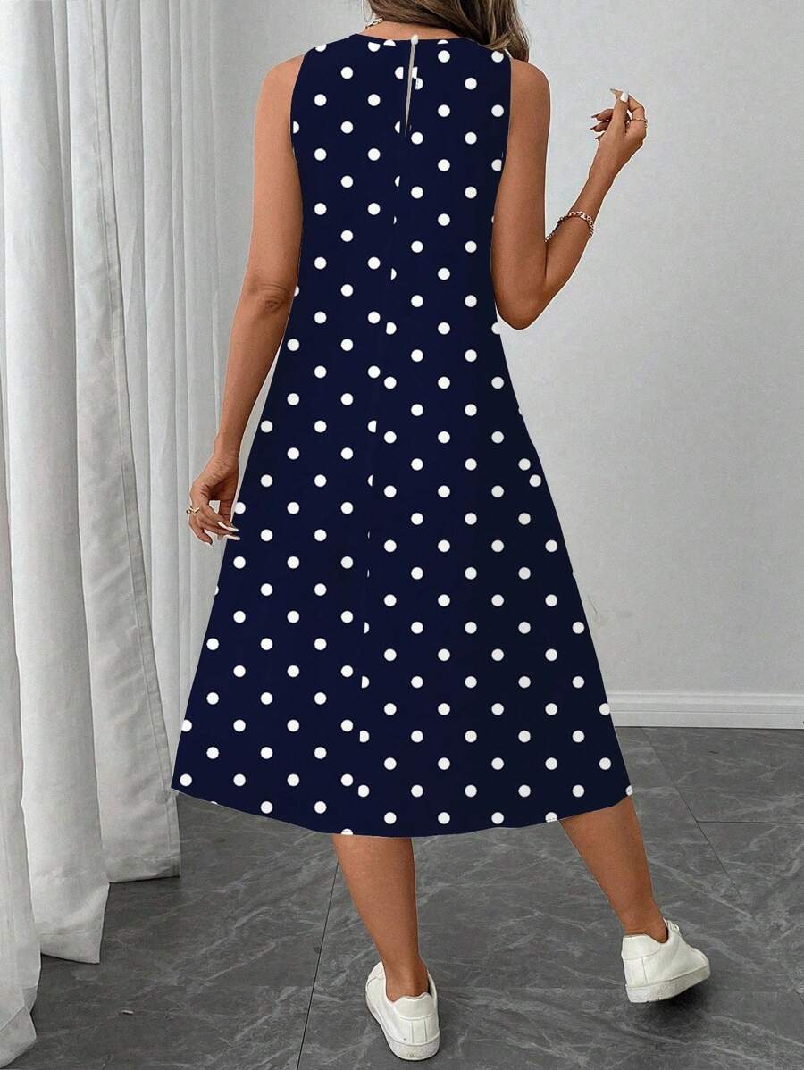 Vestido Midi Poá com Gola Redonda e Bolsos - La Lecce