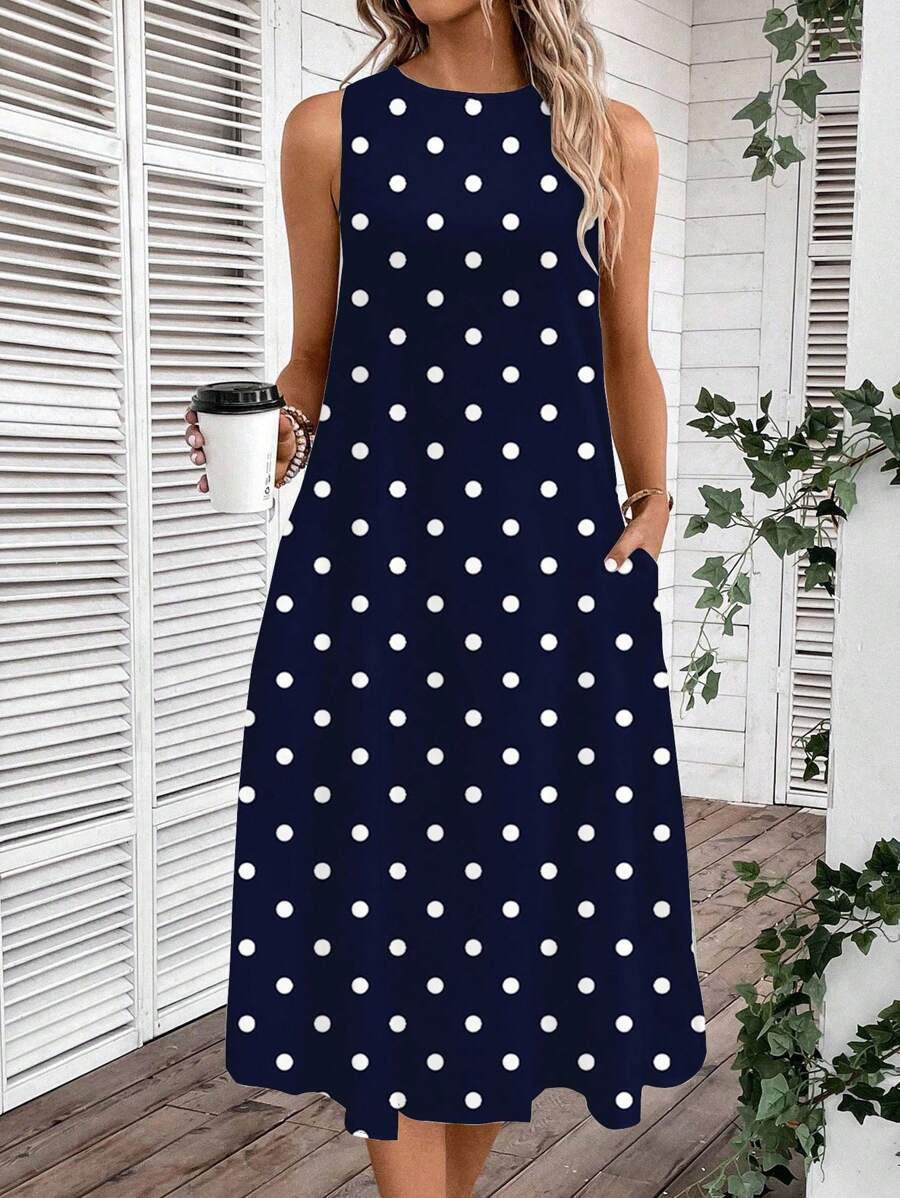 Vestido Midi Poá com Gola Redonda e Bolsos - La Lecce