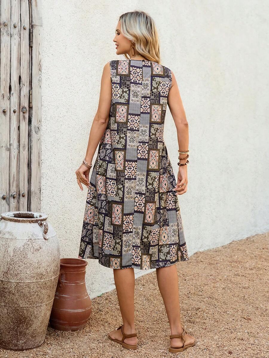 Vestido Midi Sem Mangas com Gola Redonda e Bolsos - La Lecce