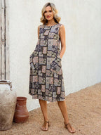 Vestido Midi Sem Mangas com Gola Redonda e Bolsos - La Lecce