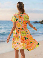 Vestido Curto Boho com Babado e Detalhe em Pompom - La Lecce