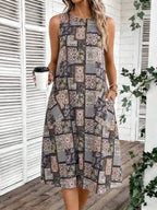 Vestido Midi Sem Mangas com Gola Redonda e Bolsos - La Lecce