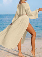 Conjunto de Praia 2 Peças com Cropped de Manga Longa e Saia com Fenda