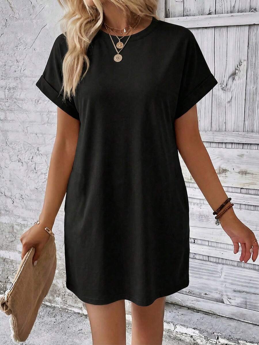 Vestido Curto Camiseta com Bolsos e Manga Morcego - La Lecce