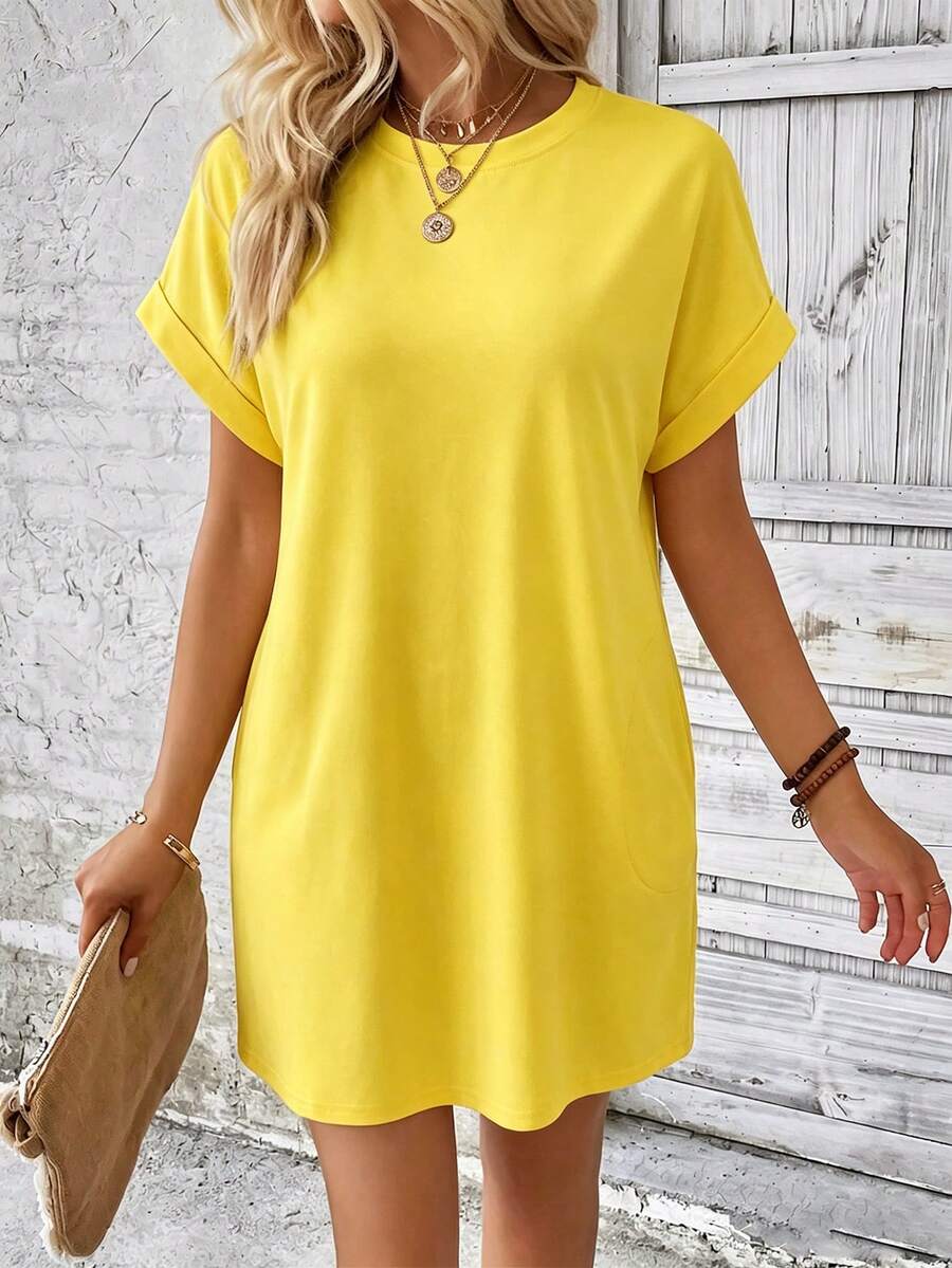 Vestido Curto Camiseta com Bolsos e Manga Morcego - La Lecce