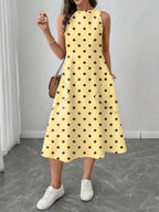 Vestido Midi Poá com Gola Redonda e Bolsos - La Lecce