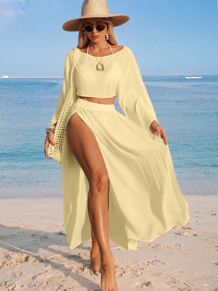 Conjunto de Praia 2 Peças com Cropped de Manga Longa e Saia com Fenda