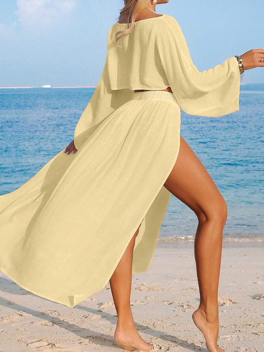 Conjunto de Praia 2 Peças com Cropped de Manga Longa e Saia com Fenda