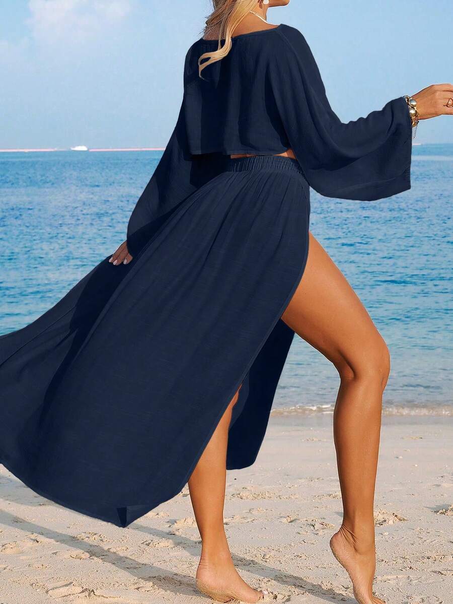 Conjunto de Praia 2 Peças com Cropped de Manga Longa e Saia com Fenda