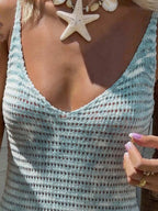 Vestido Mini em Malha com Decote V e Babado na Barra