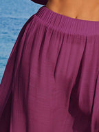 Conjunto de Praia 2 Peças com Cropped de Manga Longa e Saia com Fenda
