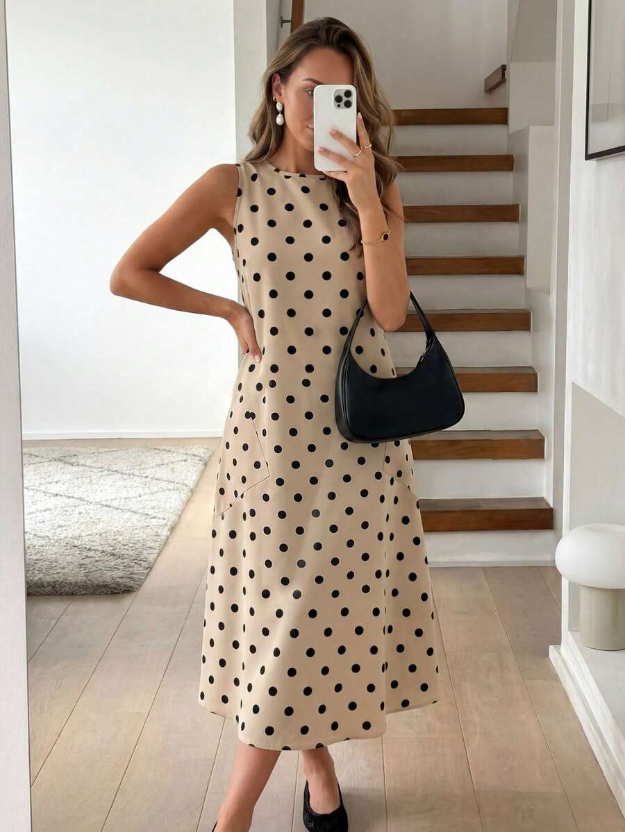 Vestido Midi Poá com Gola Redonda e Bolsos - La Lecce