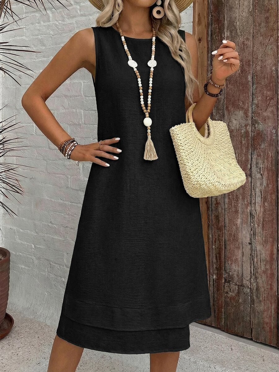 Vestido Midi Minimalista com Gola Redonda e Bainha Assimétrica - La Lecce