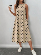 Vestido Midi Poá com Gola Redonda e Bolsos - La Lecce