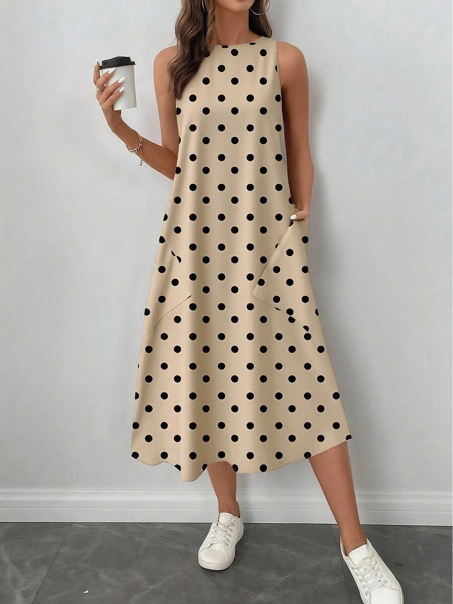 Vestido Midi Poá com Gola Redonda e Bolsos - La Lecce