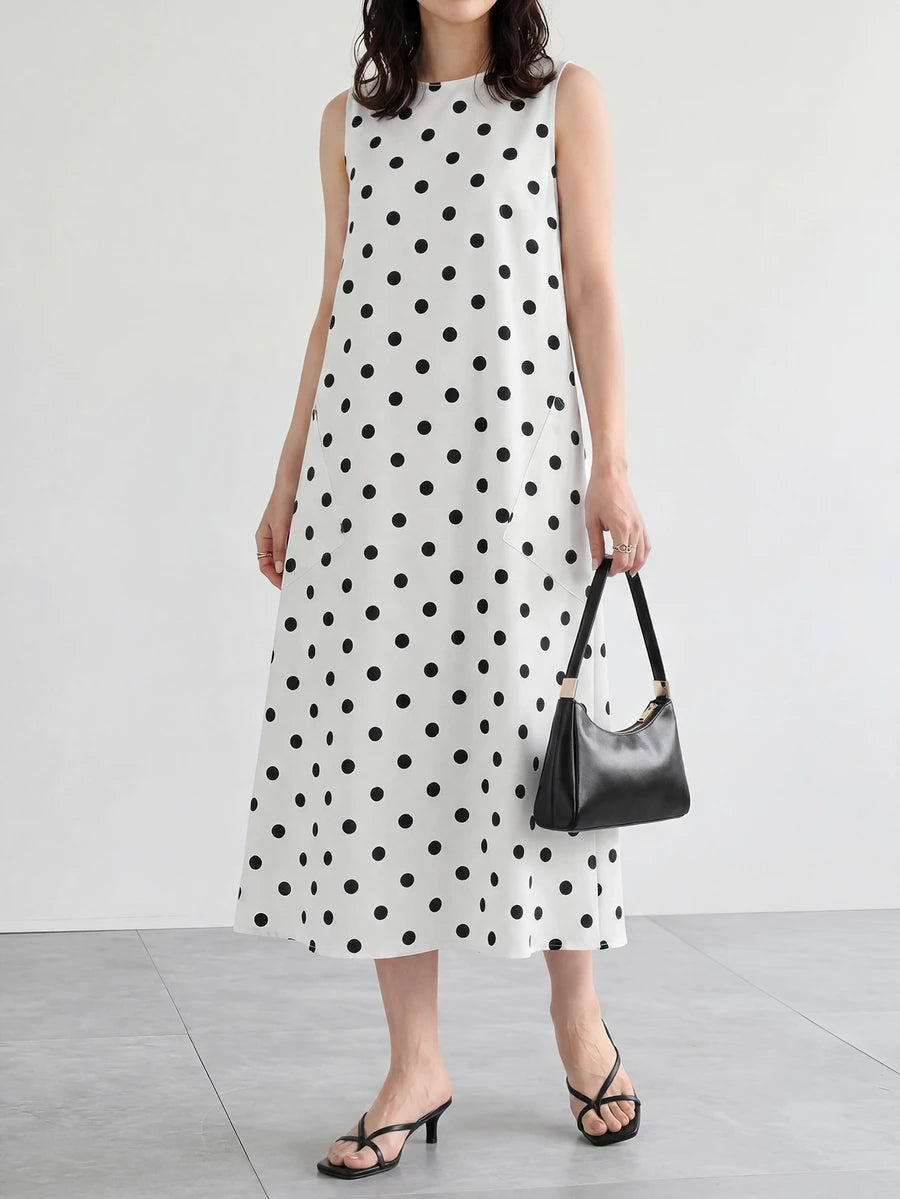 Vestido Midi Poá com Gola Redonda e Bolsos - La Lecce