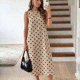 Vestido Midi Poá com Gola Redonda e Bolsos