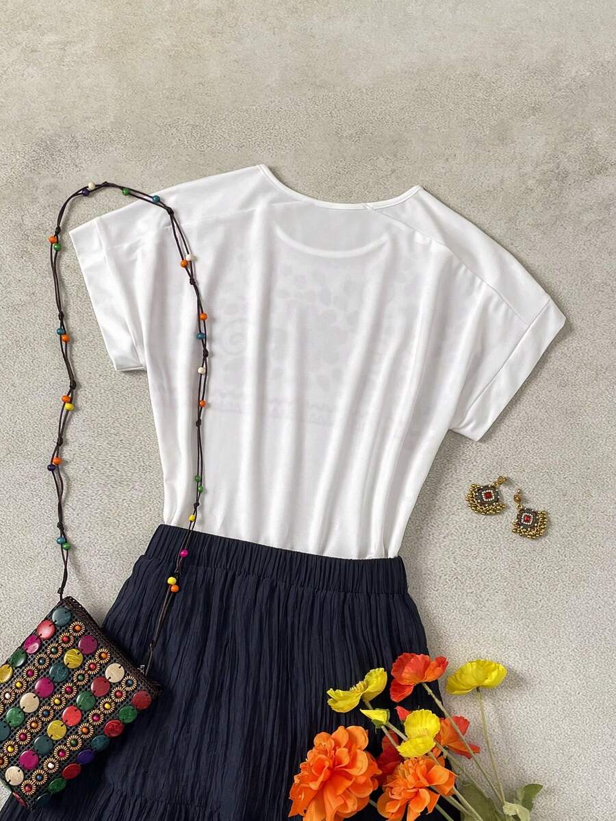 Camiseta Listrada com Manga Morcego IMG 51