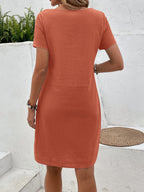 Vestido Midi Camiseta de Manga Curta com Bolsos - La Lecce