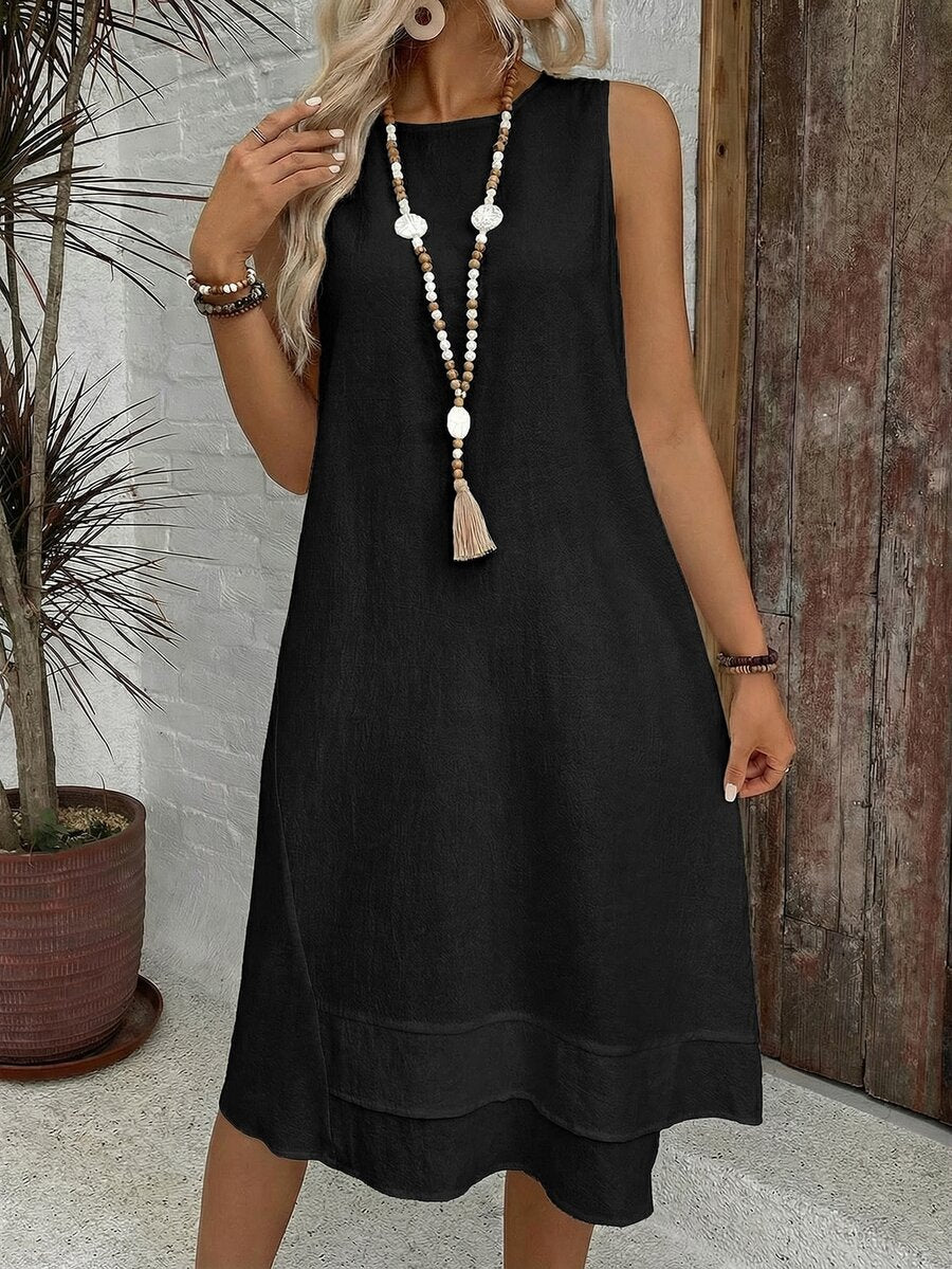 Vestido Midi Minimalista com Gola Redonda e Bainha Assimétrica - La Lecce