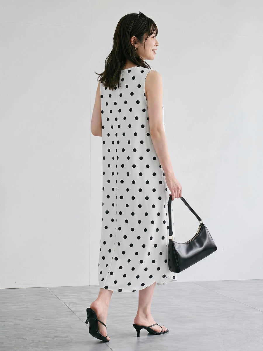 Vestido Midi Poá com Gola Redonda e Bolsos - La Lecce